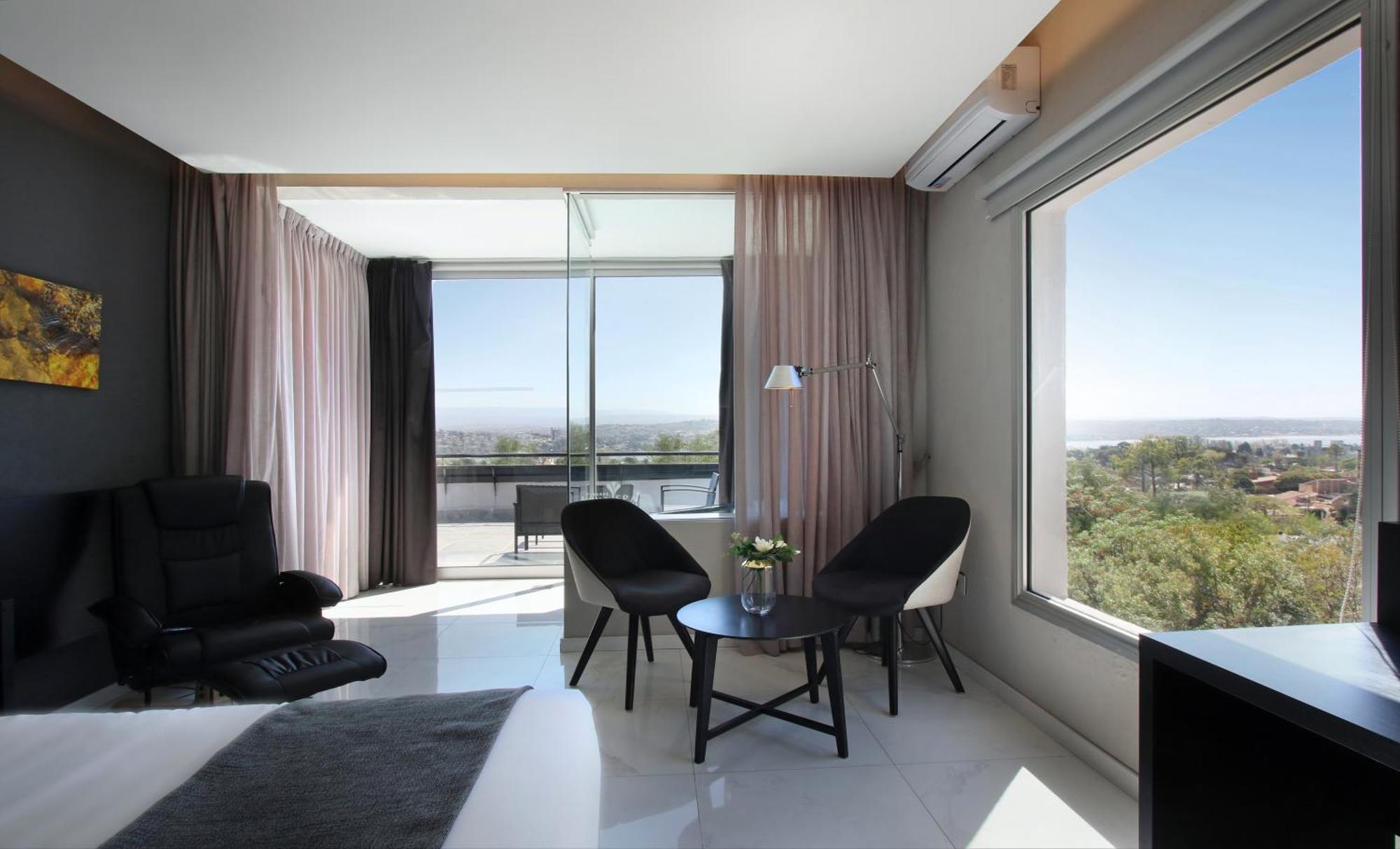Pinares Panorama Suites, Spa & Convention Center Вила Карлос Пас Екстериор снимка